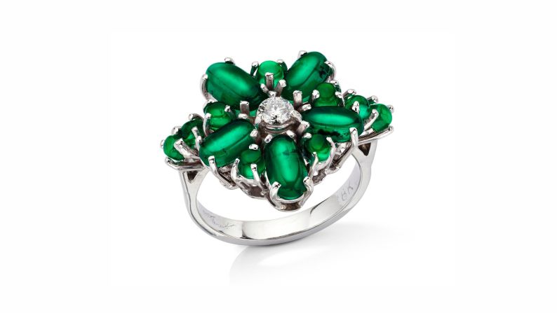 In creating this ring, Marcial de Gomar combined several rare cat's eye Muzo emeralds with diamonds and white gold.