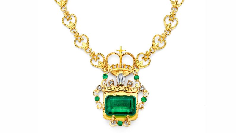 This Marcial de Gomar-designed necklace features a 24.34 carat Muzo emerald salvaged from the Spanish shipwreck Nuestra Señora de Atocha. Baguette and round-cut diamonds and emeralds further enhance the central pendant, which bears the words "Plus Ultra," a reference to the Spanish history of conquest and the motto of the Colombian Marines.