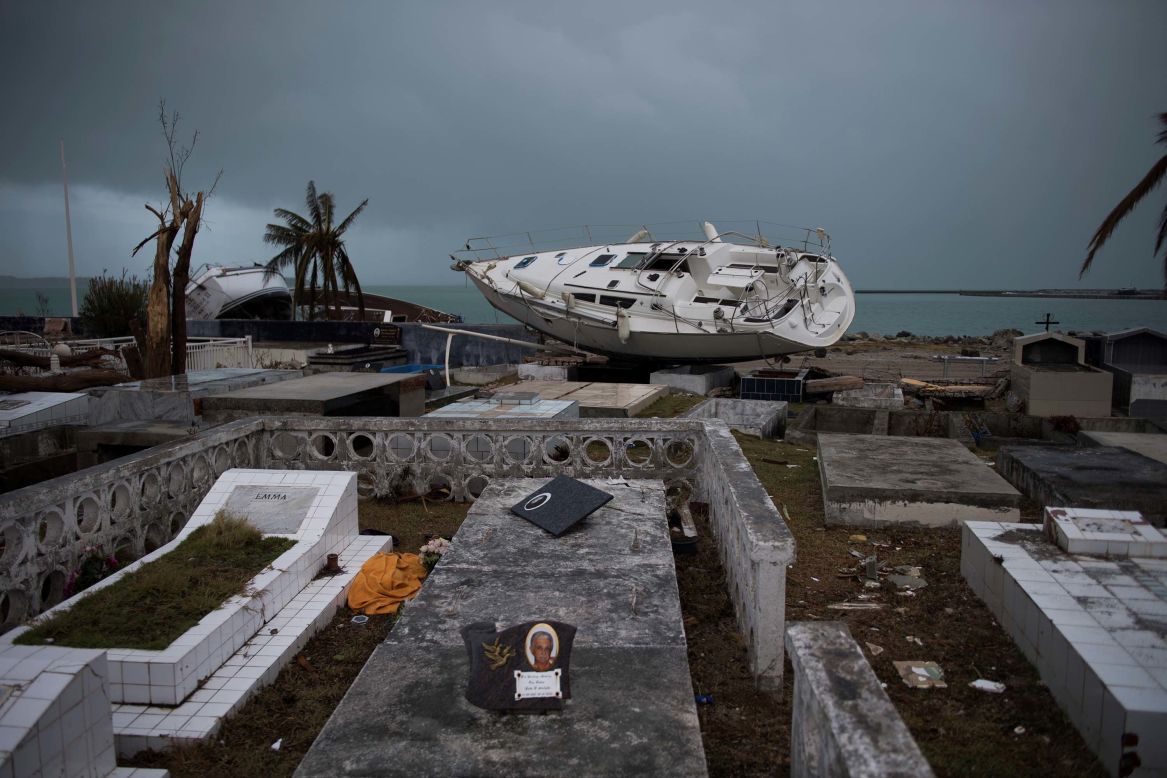 A boat rests in a cemetery after Irma tore through Marigot, St. Martin.