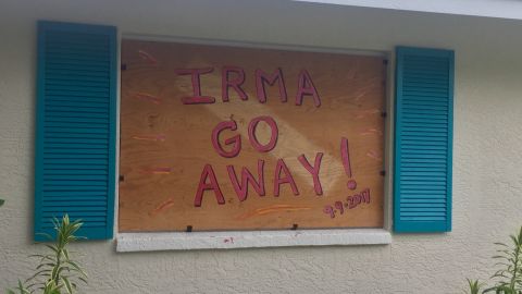 Gina Fischer boarded up her North Naples home and left a message for the storm.