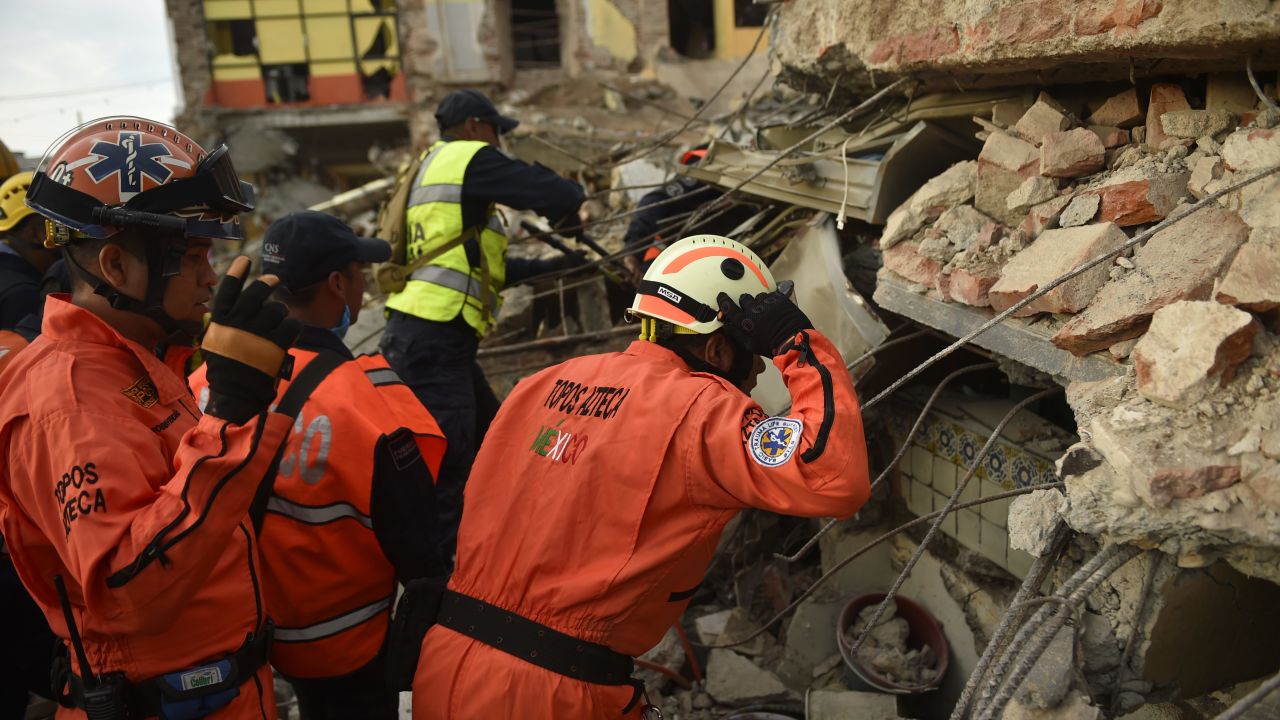 Los Topos members assist after September 8 quake in Oaxaca state.