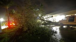 A downed tree lies across Cape Coral Parkway during Hurricane Irma in downtown Cape Coral, Fla., Sunday, Sept. 10, 2017. (AP Photo/Gerald Herbert)