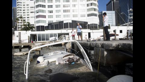 Boats are partially submerged in a marina in downtown Miami on September 11.