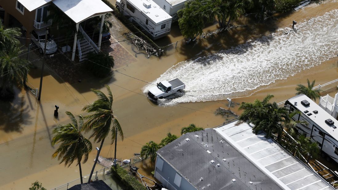 A truck drives through a flooded street in Key Largo on September 11.