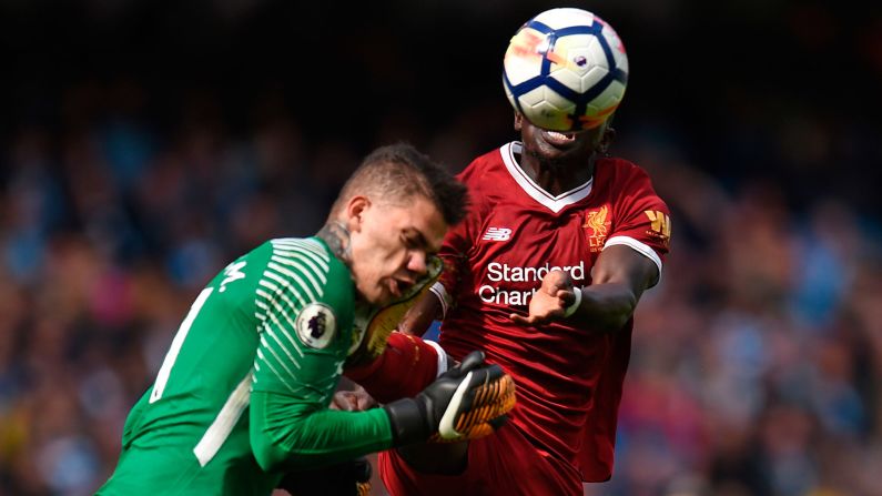 Manchester City goalkeeper Ederson gets kicked in the face by Liverpool's Sadio Mane during a Premier League match in Manchester, England, on Saturday, September 9. Mane received a red card for the high challenge, which he apologized for and said was accidental. Ederson was stretchered off.