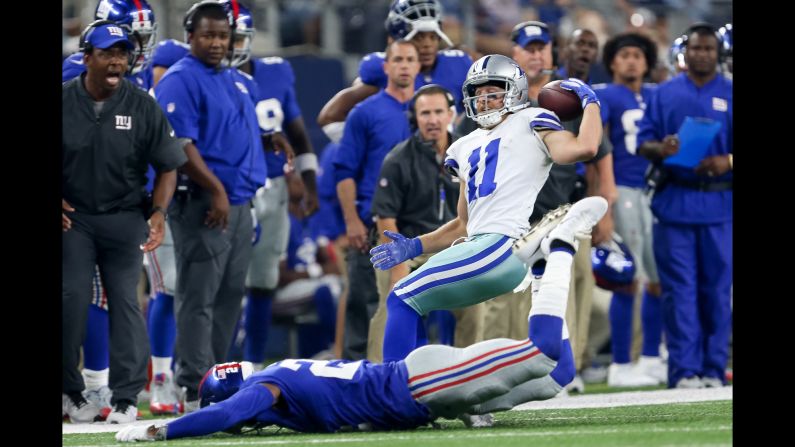 Dallas wide receiver Cole Beasley pins the ball onto his shoulder to make a catch against the New York Giants on Sunday, September 10.