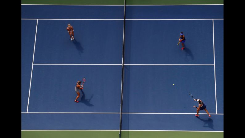 Chan Yung-jan, bottom right, returns a shot during the women's doubles final of the US Open on Sunday, September 10. Chan and Martina Hingis defeated Lucie Hradecka and Katerina Siniakova 6-3, 6-2.