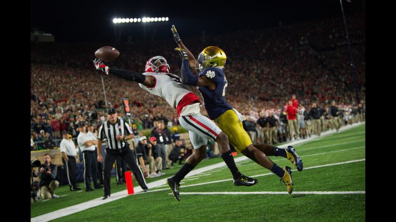 Georgia wide receiver Terry Godwin makes a one-handed touchdown catch over Notre Dame cornerback Julian Love on Saturday, September 9. Georgia edged the Fighting Irish 20-19 in South Bend, Indiana.