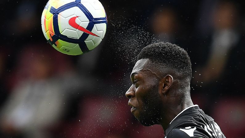 Crystal Palace defender Timothy Fosu-Mensah heads the ball during a Premier League match in Burnley, England, on Sunday, September 10.