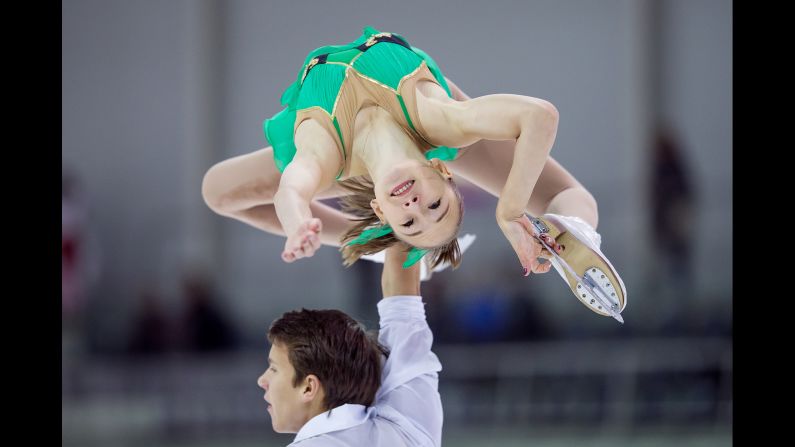 Russian figure skaters Kseniia Akhanteva, top, and Valerii Kolesov compete in Riga, Latvia, on Thursday, September 7.