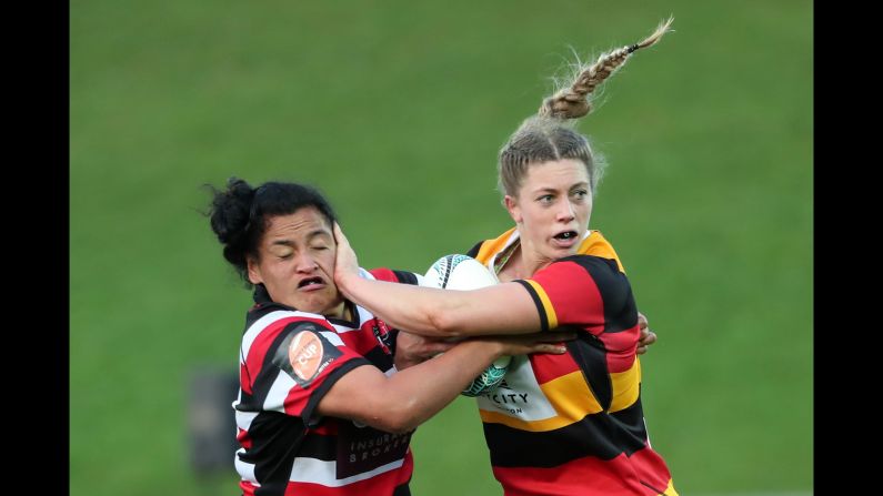 Waikato rugby player Michelle Montague fends off Victoria Subritzky during a Farah Palmer Cup match in Pukekohe, New Zealand, on Thursday, September 7.