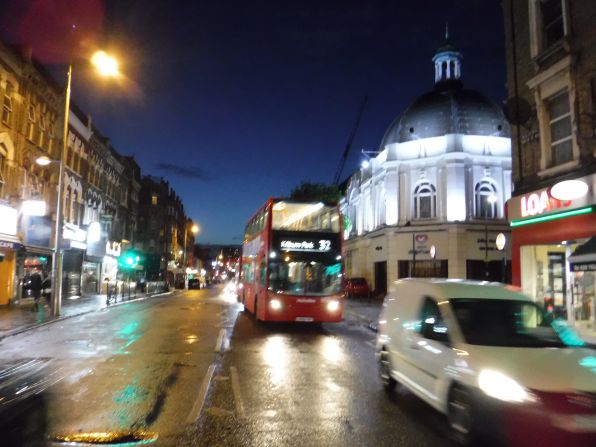 <strong>Night cityscape: </strong>Handheld in Night mode, colors were vivid but the camera struggled to satisfactorily capture slow-moving buses.