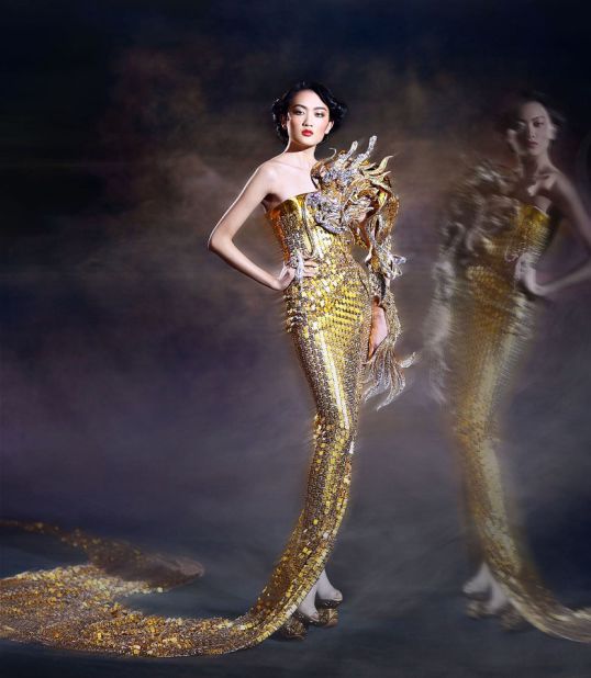 One of the dresses in the collection, called Dragon Lady, incorporates 465,756 hand-beaded pearls. 