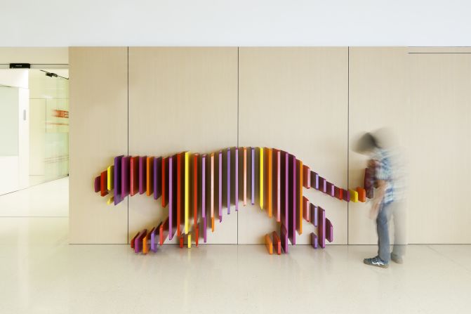 To make the Hospital Sant Joan de Déu in Barcelona a more inviting space for kids, Dani Rubio Arauna Studio and Rai Pinto Studio created playful, somewhat hidden animal shapes in pleasing colors.