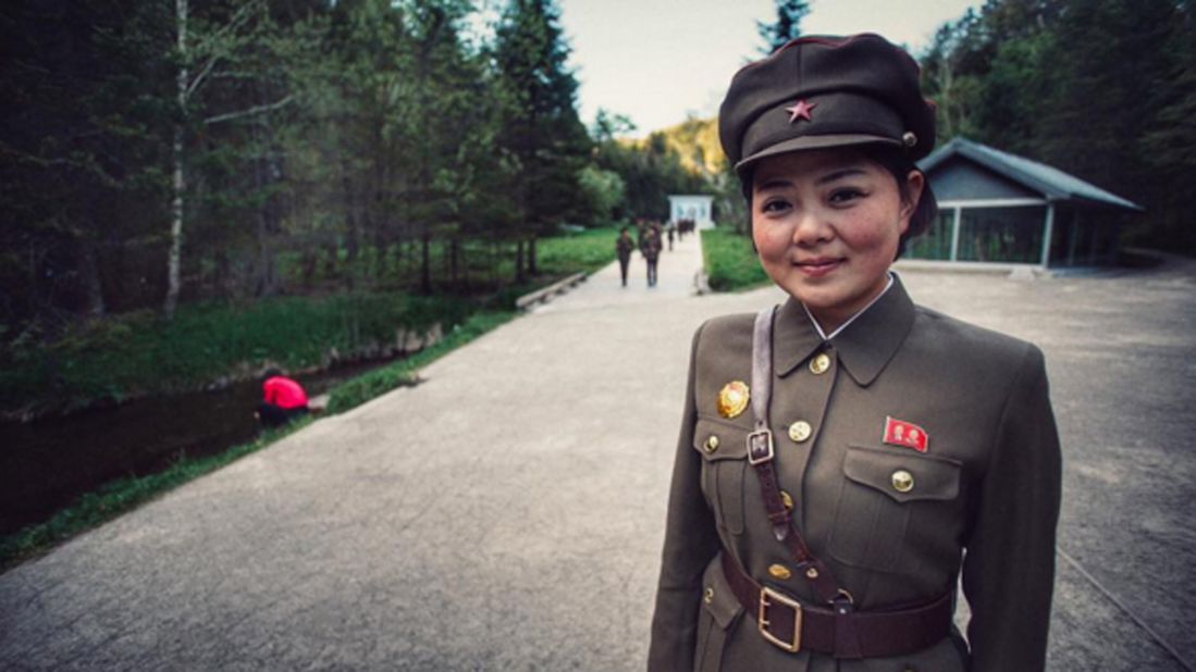 North Korean tour guide at Mt Paektu outside the alleged birth place of Kim Jong Il, on September 3. Kim is widely considered to have been born in Russia.