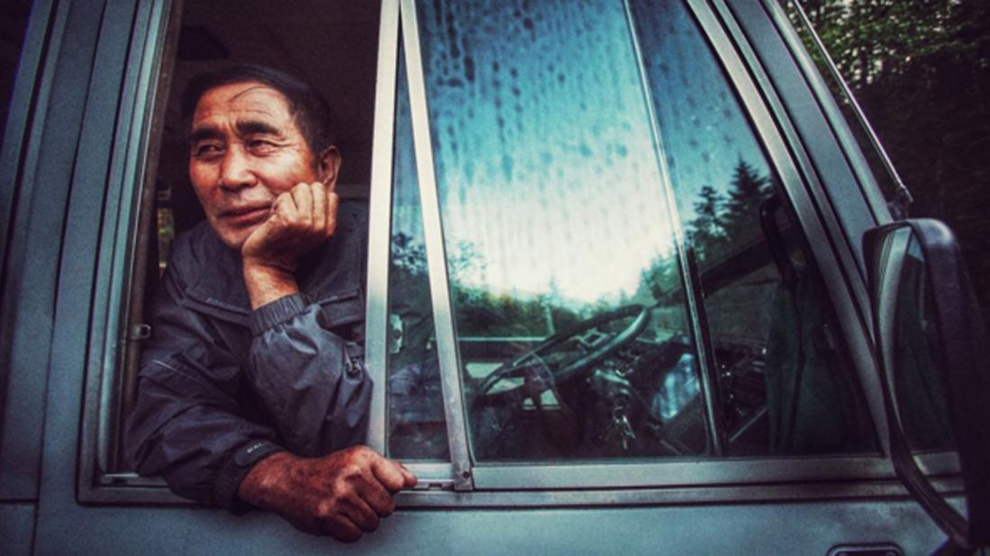 A bus driver who drives a Japanese vehicle over some of the bumpiest roads in North Korea. Taken on September 5.