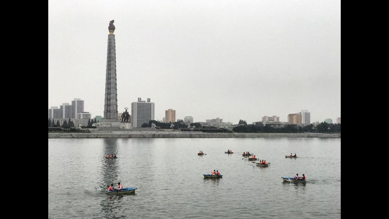 Sunday afternoon row boats on the Taedong River, Pyongyang, beside Juche Tower. Taken on September 10.