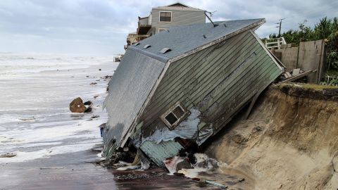 In the aftermath of Hurricane Irma, a house slides into the Atlantic Ocean in Ponte Vedra Beach, Florida, on Monday, September 11.