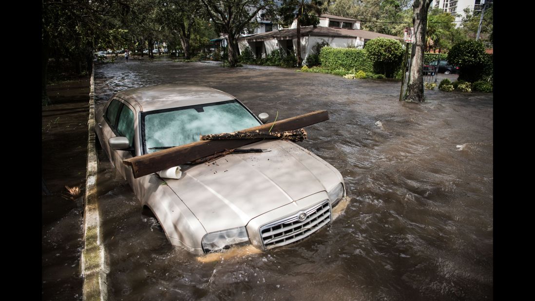 Floodwaters inundate a car in Jacksonville on September 11.