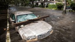 A vehicle is inundated by storm surge flood waters in Jacksonville, Florida, on September 11.