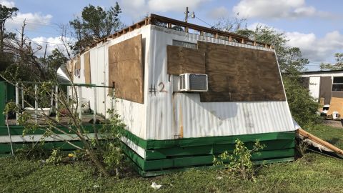 Residents boarded up their homes before they fled.