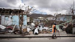 A man walks on a street on September 10, 2017 in Marigot on the island of Saint-Martin after it was devastated by Irma hurricane. / AFP PHOTO / Martin BUREAU        (Photo credit should read MARTIN BUREAU/AFP/Getty Images)