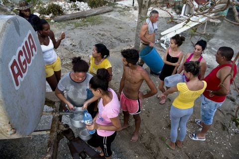 Cubans affected by Hurricane Irma line up to collect drinking water in Isabela de Sagua, Cuba, on Monday, September 11. 