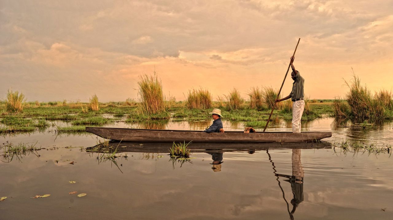 Mokoro canoes are used to travel through the wetlands of Okavango Delta.