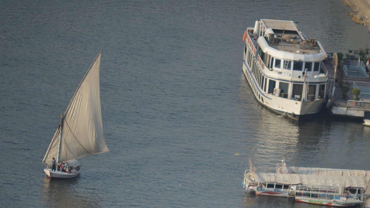 Luxury cruise ship Oberoi Zahra sails across the Nile between Luxor and Aswan.
