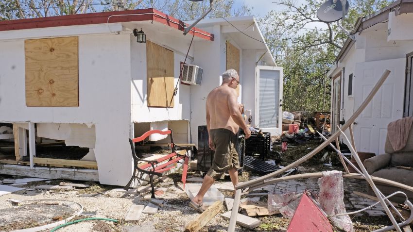 Gullermo Tejera, walks among the damamge to his mobile home in the wake of hurricane Irma at Tavenier Key, Florida on September 12, 2017.
Hurricane Irma weakened slightly to a Category 4 storm early last Saturday, according to the US National Hurricane Center, after making landfall hours earlier in Cuba with maximum-strength Category 5 winds.  / AFP PHOTO / Gaston De Cardenas        (Photo credit should read GASTON DE CARDENAS/AFP/Getty Images)