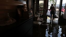 BONITA SPRINGS, FL - SEPTEMBER 12: Carolyn Cole removes her belongings from her home that was flooded by Hurricane Irma on September 12, 2017 in Bonita Springs, Florida. On Sunday Hurricane Irma hit Florida's west coast leaving widespread power outages and flooding.  (Photo by Mark Wilson/Getty Images)