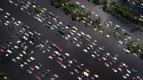 Floodwaters surround vehicles in Callahan, Florida, on Tuesday, September 12. 
