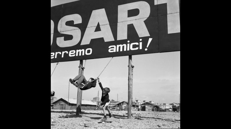 The Porta Portese section of Rome is home to a giant flea market that was notorious, at least in 1964, Wurmfeld says, as the place where if you lost your wallet, you might find it for sale there. This scene shows two boys playing with a makeshift swing attached to a giant billboard in what looked like a wasteland.