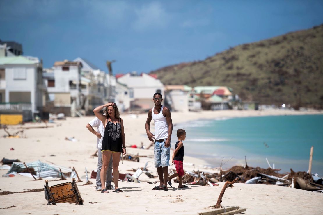 People inspect the damage to the  Grand-Case Bay beach on St. Martin on Tuesday.