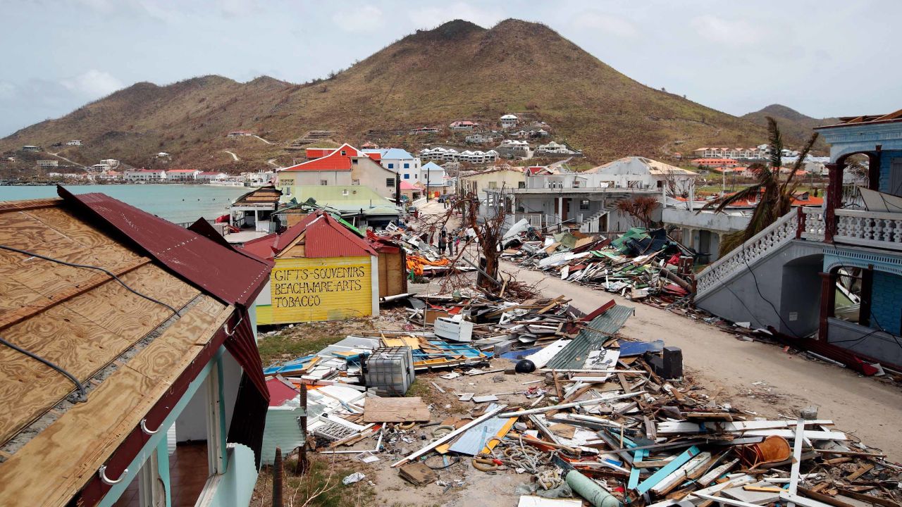 This general view shows buildings destroyed by Hurricane Irma on the French Caribbean island of Saint Martin on September 12, 2017, during the visit of France's President Emmanuel Macron . 
French President Emmanuel Macron and British Foreign Secretary Boris Johnson travelled Tuesday to the hurricane-hit Caribbean, rebuffing criticism over the relief efforts as European countries boost aid to their devastated island territories. / AFP PHOTO / POOL / Christophe Ena        (Photo credit should read CHRISTOPHE ENA/AFP/Getty Images)