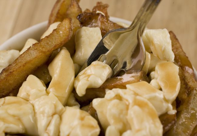 <strong>Poutine, Canada</strong>: This iconic Quebec dish mixes french fries, cheddar cheese and gravy to make one of Canada's iconic foods.