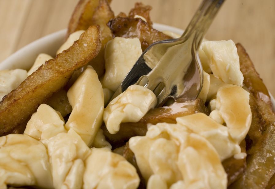 <strong>Poutine, Canada</strong>: This iconic Quebec dish mixes french fries, cheddar cheese and gravy to make one of Canada's iconic foods.