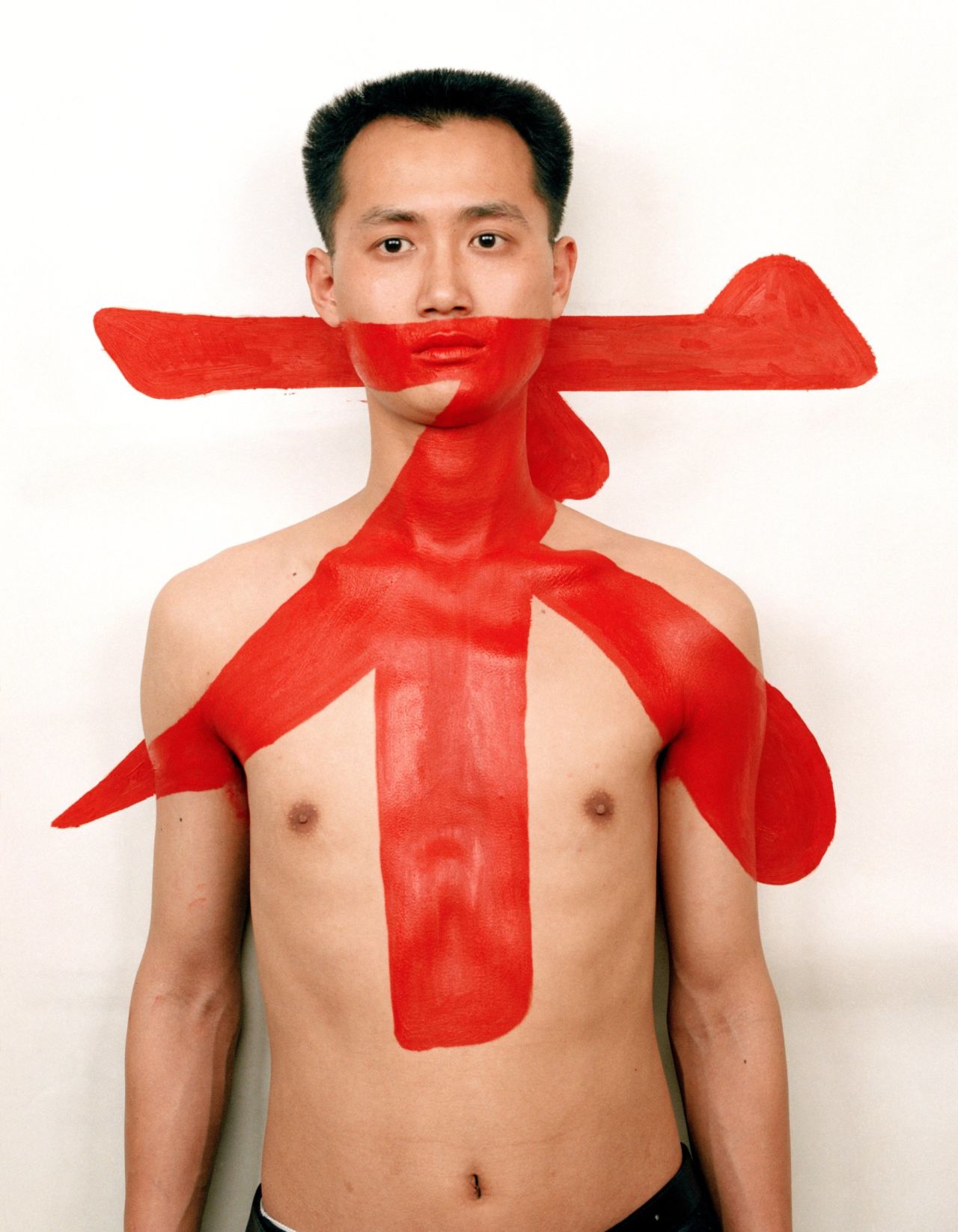 Self-portrait from Qiu Zhijie's "Tattoo" series. The Chinese character "bu" in red translates to "no" in English.