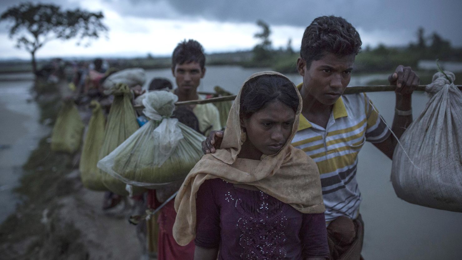 Rohingya refugees after crossing the border between Myanmar and Bangladesh. 