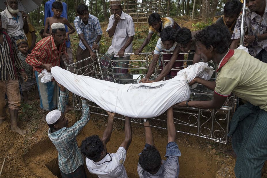 Rohingya refugees bury Nur Ali in Kutupalong, Bangladesh, on September 13. Ali was a 50-year-old man who died of gunshot wounds he sustained while fleeing violence in Myanmar.