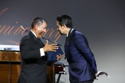 Rep. Adriano Espaillat embraces "Hamilton" creator Lin-Manuel Miranda after awarding him the Congressional Hispanic Caucus Institute's Medallion of Excellence on Wednesday, Sept. 13, 2017.
