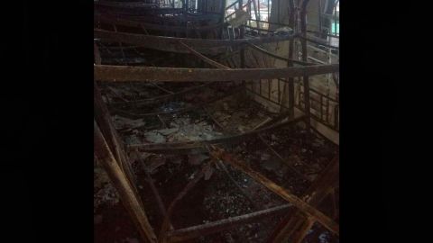 Melted bunk beds are seen on the second floor of the Kuala Lumpur religious school that caught fire.