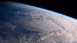 FILE - This photo made available by NASA shows Hurricane Harvey over Texas on Saturday, Aug. 26, 2017, seen from the International Space Station. Experts say a combination of unusual factors turned Harvey into a deadly monster. The storm intensified just before it hit land, parked itself over one unfortunate area and dumped a record amount of rain. (Randy Bresnik/NASA via AP)
