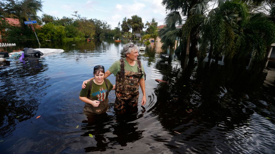 Kelly McClenthen returns to her flooded home with boyfriend Daniel Harrison in the aftermath of Hurricane Irma in Bonita Springs, Florida.