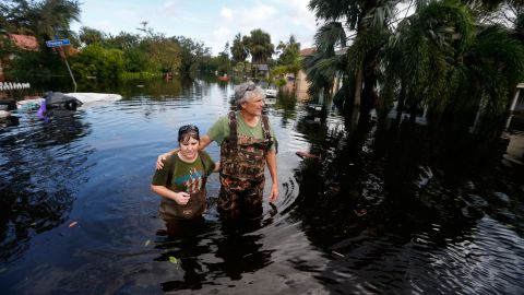 Kelly McClenthen returns to her flooded home with boyfriend Daniel Harrison in the aftermath of Hurricane Irma in Bonita Springs, Florida.