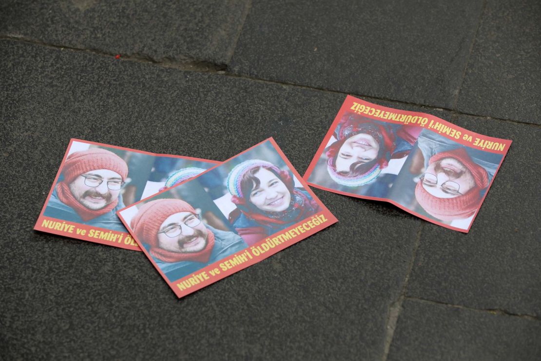 Leaflets bearing pictures of the two hunger-strikers are seen on a street after a support demonstration in the Turkish capital of Ankara on June 3.