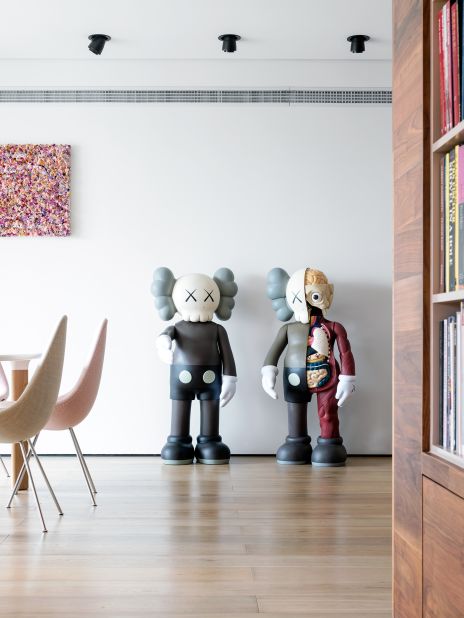 As well as works by leading Chinese artists, Ying's collection also includes works from the West, such as these sculptures by the American pop artist Kaws. 