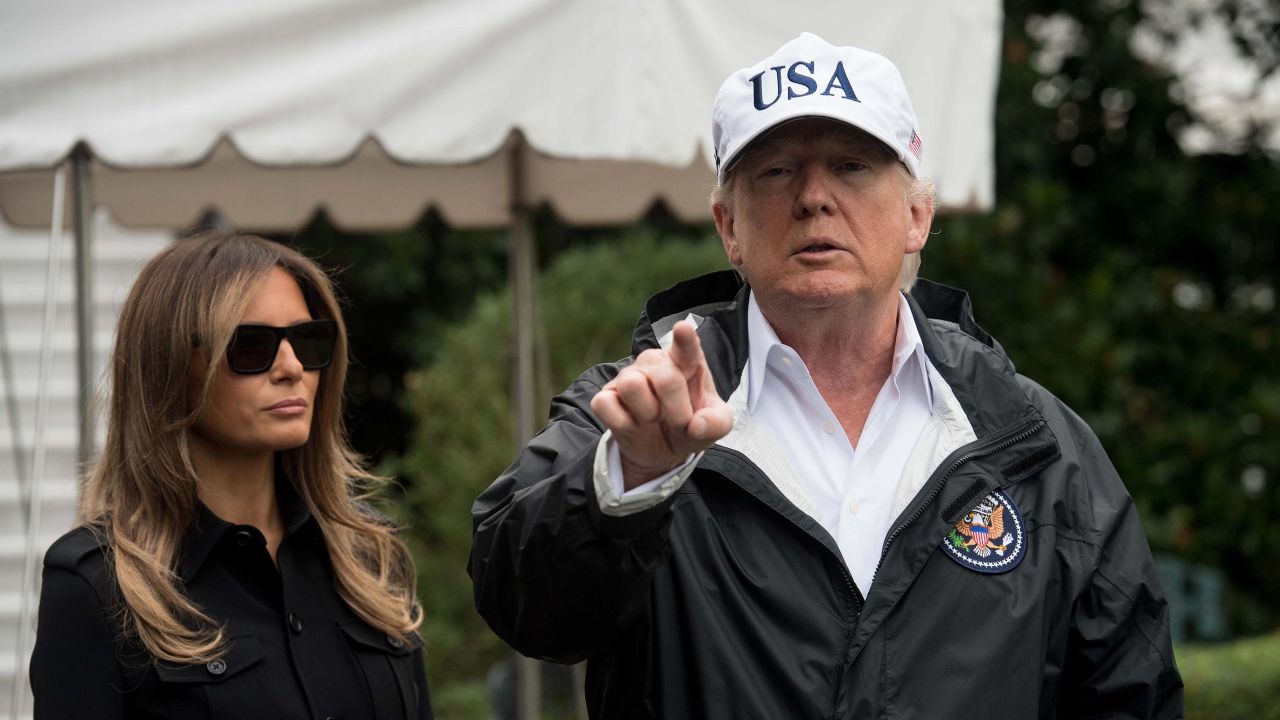 US President Donald Trump speaks to the press with First Lady Melania Trump before they depart the White House in Washington, DC, on September 14, 2017 for Florida.
The Trumps will visit areas affected by Hurricane Irma. / AFP PHOTO / NICHOLAS KAMMNICHOLAS KAMM/AFP/Getty Images