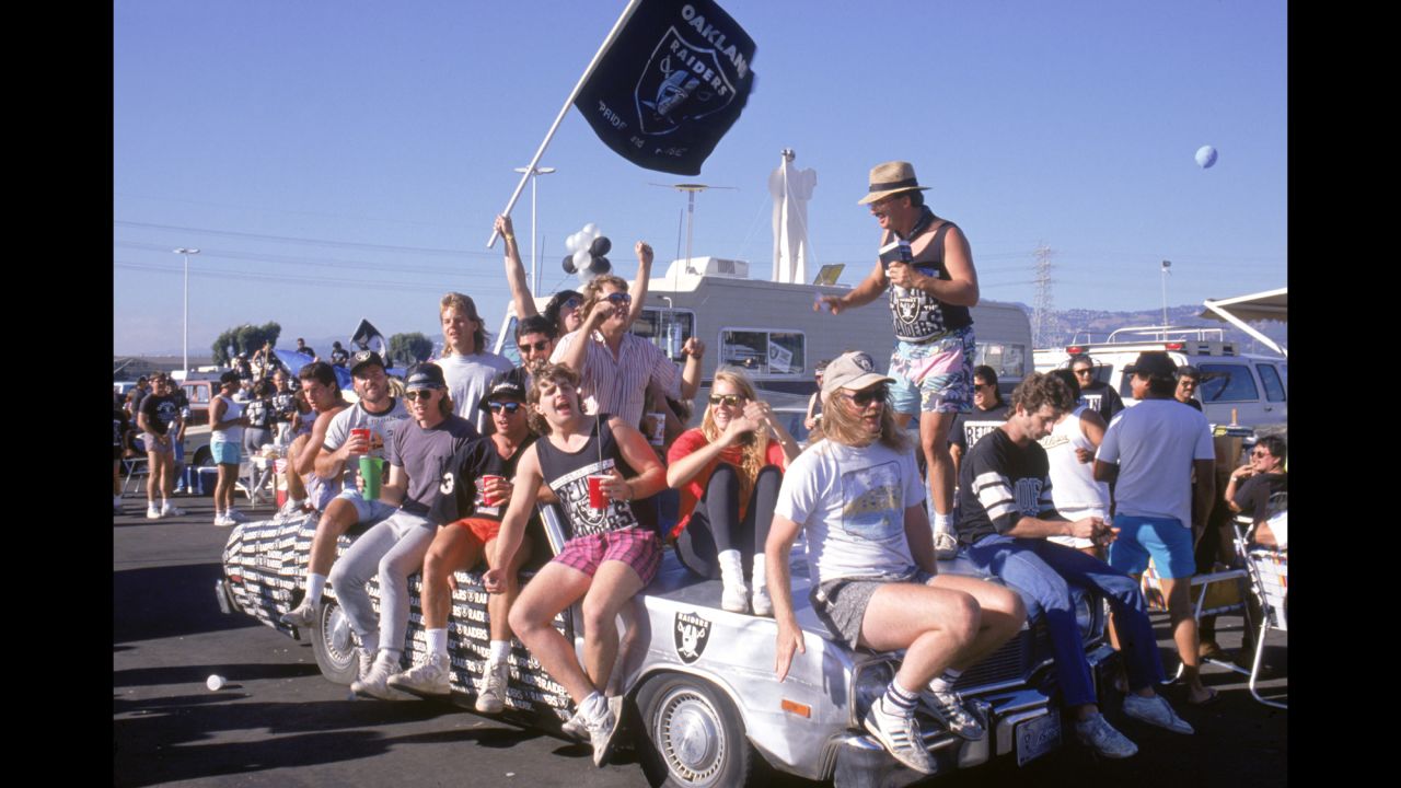 Oakland Raiders fans show their team spirit outside the Oakland-Alameda County Coliseum in 1989 (even though at that time the NFL team was the Los Angeles Raiders). 