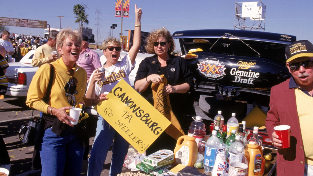 TEMPE, AZ - JANUARY 28:  Pittsburgh Pirates fans pose for a portrait during a tailgate party prior to Super Bowl XXX against the Dallas Cowboys at Sun Devil Stadium at Tempe, Arizona, on January 28, 1996. The Cowboys won 27-17. (Photo by George Rose/Getty Images)